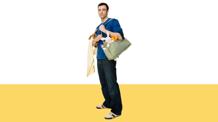 photo of a man holding a diaper bag and baby supplies from the Pro Legal Care LLC blog post about the putative fathers registry
