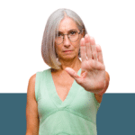 photo of woman holding her hand up to gesture "stop" from blog post about what is considered harassment by a co-parent