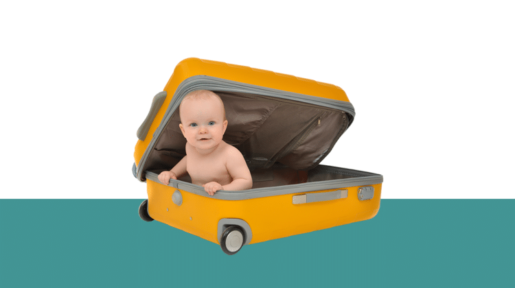 photo of baby peeking out from a suitcase from the Pro Legal Care LLC blog post about ICPC adoption
