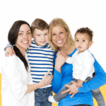 photo of a mom, stepmom, and two kids from a blog post about Healthy Co-Parenting Boundaries While in a New Relationship